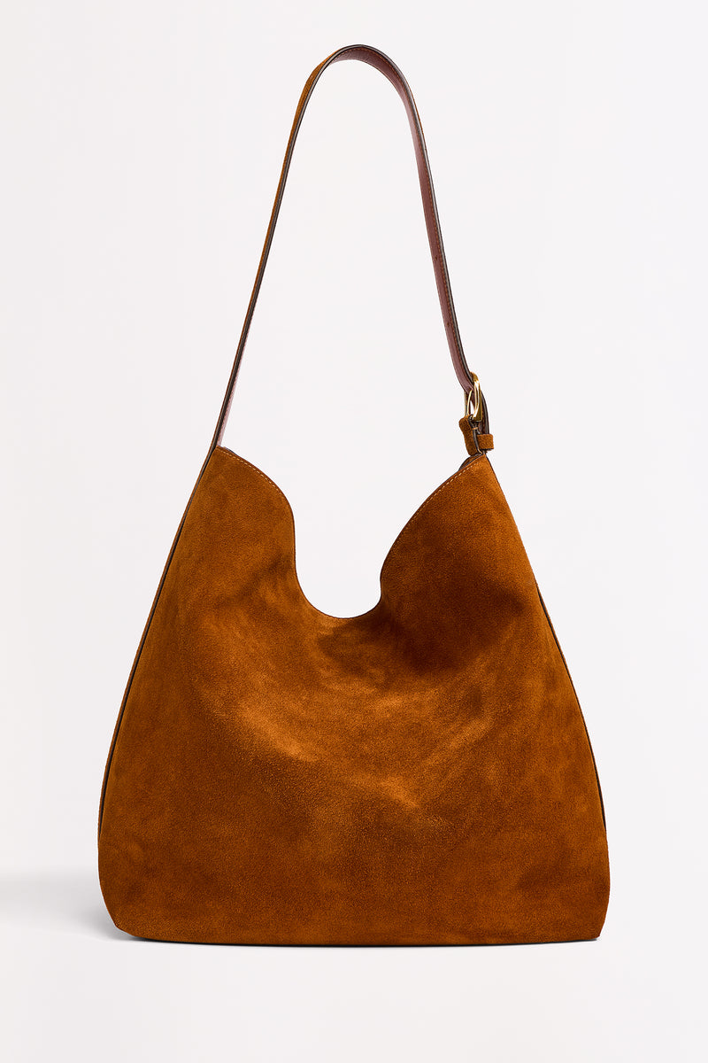 Brown leather handbag on a white background